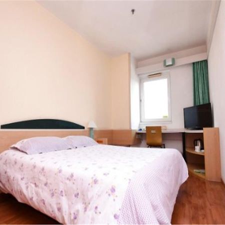 Motel Qingdao Jiaonan Renmin Road Business Street Esterno foto