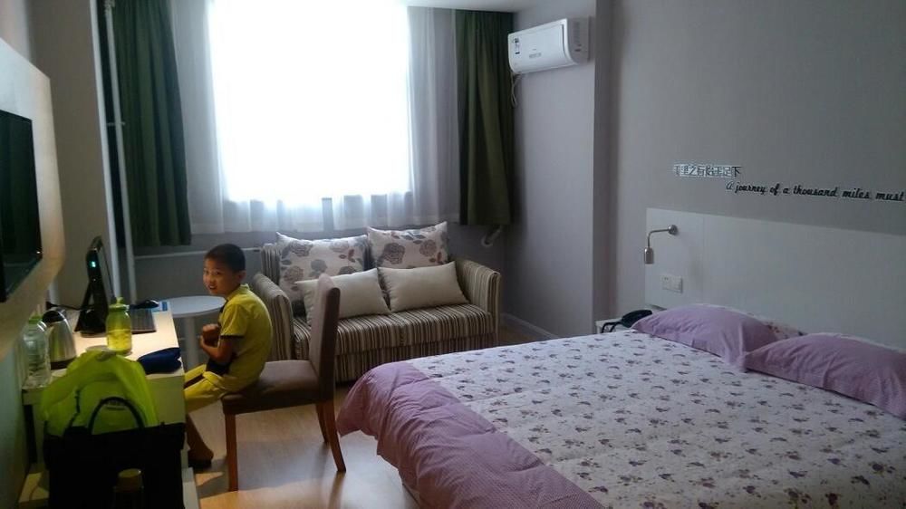 Motel Qingdao Jiaonan Renmin Road Business Street Esterno foto