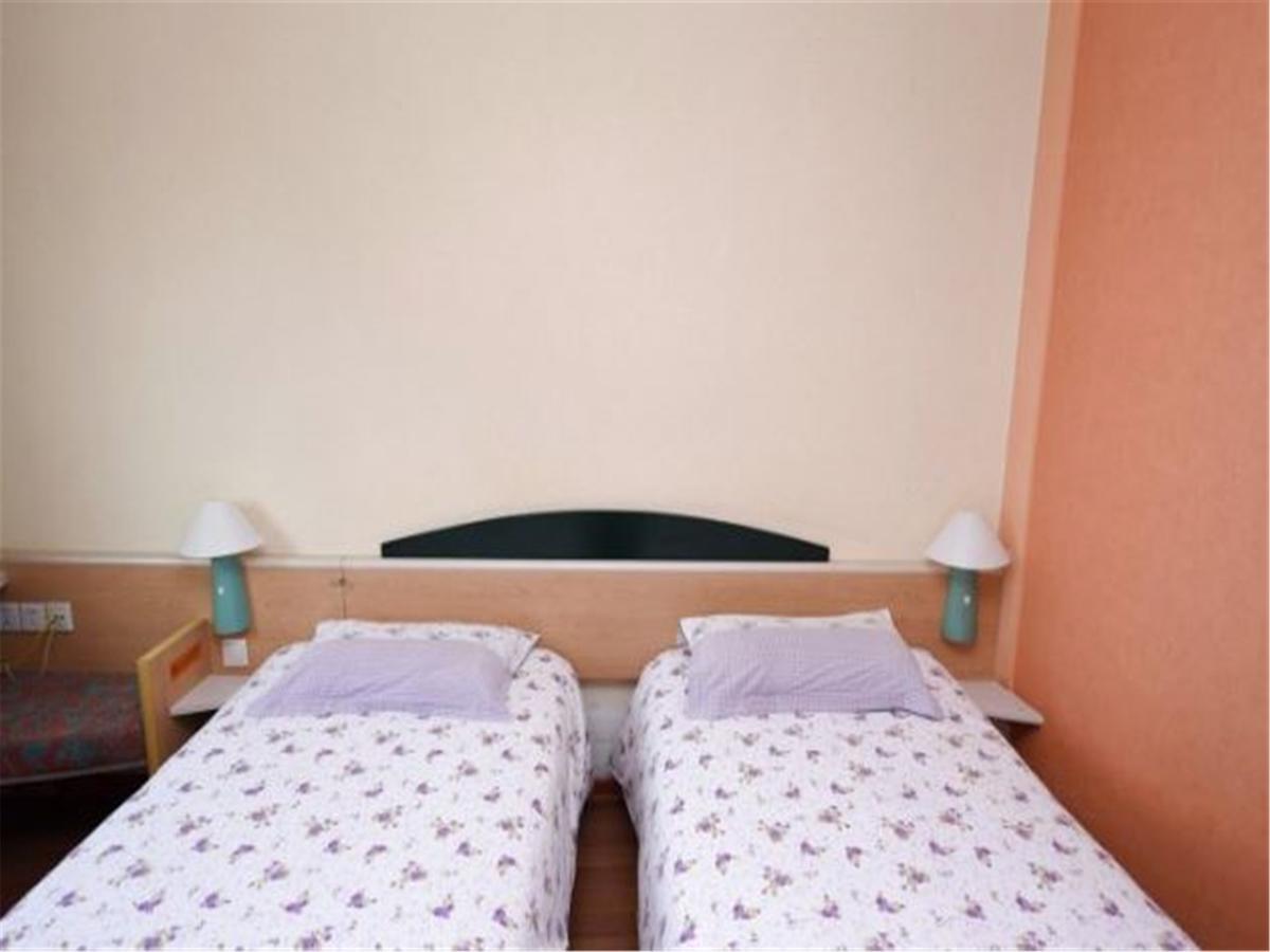 Motel Qingdao Jiaonan Renmin Road Business Street Esterno foto